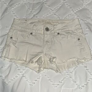 American Eagle Cream Distressed Denim Shorts